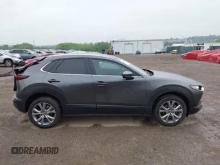 2023 Mazda CX-30 S Preferred z VIN 3MVDMBCM5PM576771, wystawiony jako IAAI lot #42244842 z przebiegiem 14 814 mil mil oraz . Historia ofert i sprzedaży dostępna na DreamBid. Obrazek 13.