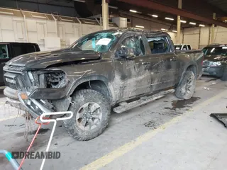 2020 Ram 1500 Rebel with VIN 1C6SRFLT0LN162491, listed as a IAAI auction lot 41841159 with 58,265 mi miles and . Bid and sale history available at DreamBid. Image 2.