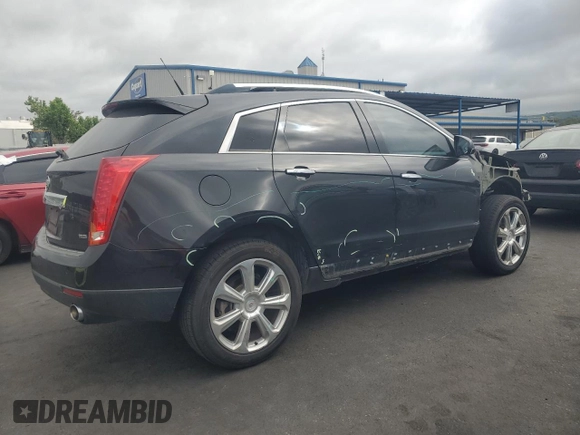 2013 Cadillac SRX Performance Collection with VIN 3GYFNDE33DS555717, listed as a Copart auction lot 53308195 with 125,528 mi miles and Salvage Title. Bid and sale history available at carsss.com. Image 3.