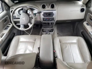 2006 Mitsubishi Raider z VIN 1Z3HT48N36S540902, wystawiony jako Copart lot #73397504 z przebiegiem 126 311 mil mil oraz Czysty tytuł • Clean title. Historia ofert i sprzedaży dostępna na DreamBid. Obrazek 8.