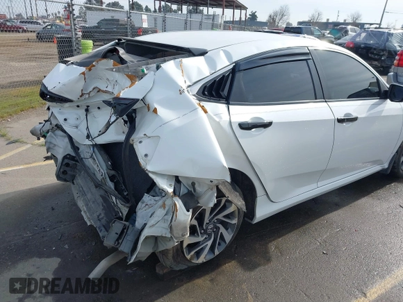 2016 Honda Civic EX with VIN 19XFC2F72GE097060, listed as a IAAI auction lot 41626940 with 156,941 mi miles and . Bid and sale history available at DreamBid. Image 18.