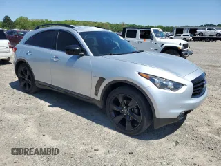 2016 Infiniti QX70 z VIN JN8CS1MWXGM752128, wystawiony jako Copart lot #52147115 z przebiegiem 122 637 mil mil oraz Tytuł czysty. Historia ofert i sprzedaży dostępna na DreamBid. Obrazek 4.