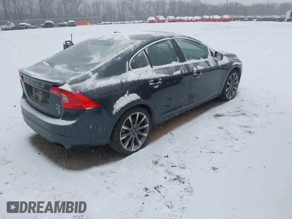 2015 Volvo S60 T5 Premier with VIN YV1612TK6F1348608, listed as a IAAI auction lot 41229153 with 73,019 mi miles. Bid and sale history available at carsss.com. Image 4.