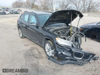 2015 BMW X1 xDrive28i with VIN WBAVL1C57FVY28954, listed as a IAAI auction lot 41857286 with 1 mi miles. Bid and sale history available at carsss.com. Image 1.