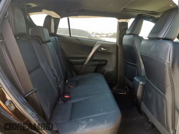 2018 Toyota RAV4 SE with VIN 2T3NFREV6JW436488, listed as a Copart auction lot 60297905 with 74,034 mi miles and Salvage title. Bid and sale history available at DreamBid. Image 11.