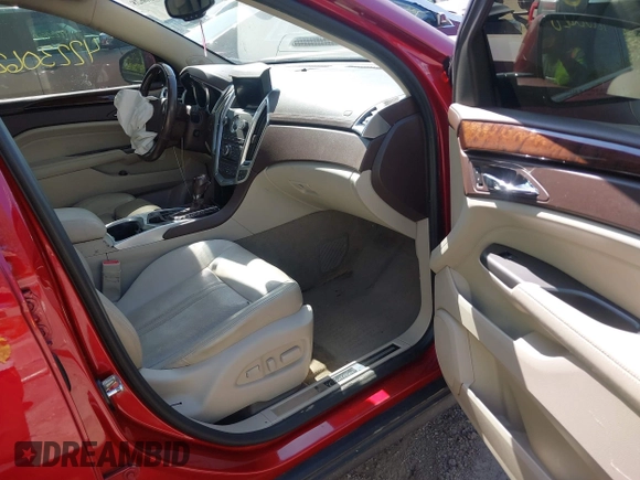 2012 Cadillac SRX Premium Collection with VIN 3GYFNFE35CS579477, listed as a IAAI auction lot 42230628 with 138,789 mi miles and . Bid and sale history available at DreamBid. Image 5.