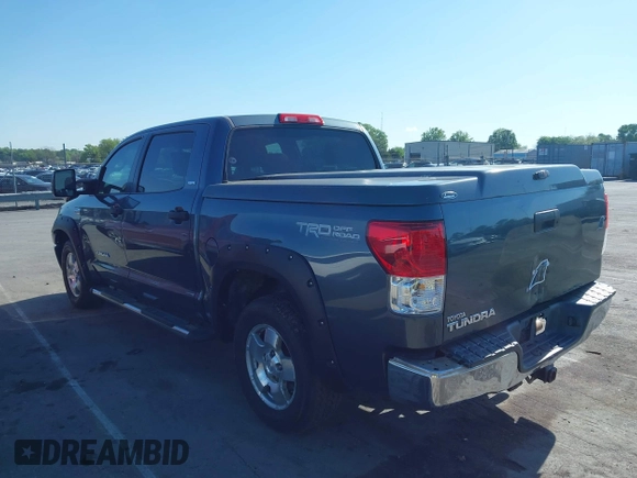 2010 Toyota Tundra with VIN 5TFEY5F11AX097360, listed as a IAAI auction lot 41990256 with 350,830 mi miles and . Bid and sale history available at DreamBid. Image 14.