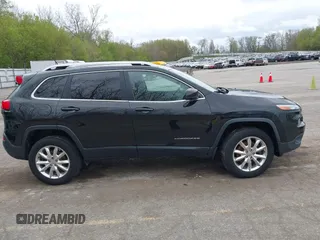 2015 Jeep Cherokee Limited with VIN 1C4PJMDB9FW680565, listed as a IAAI auction lot 42134052 with 192,728 mi miles. Bid and sale history available at carsss.com. Image 13.