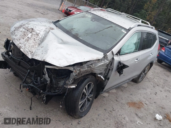 2017 Nissan Rogue SV with VIN JN8AT2MT7HW143178, listed as a IAAI auction lot 41015343 with 139,828 mi miles and . Bid and sale history available at DreamBid. Image 18.