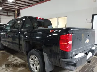 2018 Chevrolet Silverado 1500 LT with VIN 3GCUKREC2JG178119, listed as a IAAI auction lot 41609027 with Not Provided miles. Bid and sale history available at carsss.com. Image 3.