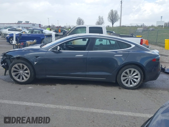 2016 Tesla Model S 70 with VIN 5YJSA1E14GF157118, listed as a IAAI auction lot 41794381 with 53,651 mi miles and . Bid and sale history available at DreamBid. Image 15.