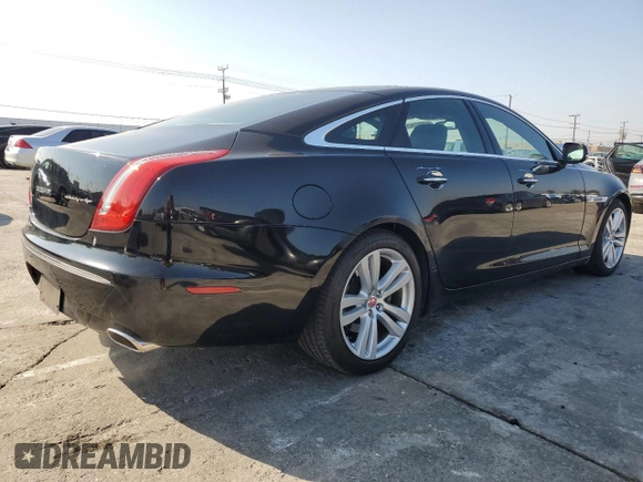 2011 Jaguar XJ with VIN SAJWA1CB4BLV05830, listed as a Copart auction lot 43007345 with 72,933 mi miles and Salvage title. Bid and sale history available at DreamBid. Image 3.