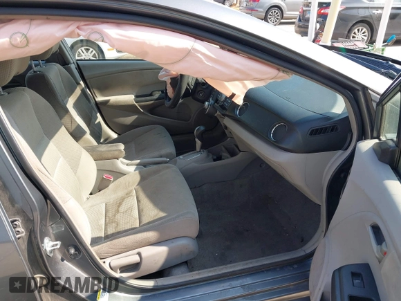 2011 Honda Insight EX with VIN JHMZE2H7XBS006254, listed as a IAAI auction lot 42222213 with 244,078 mi miles and . Bid and sale history available at DreamBid. Image 5.