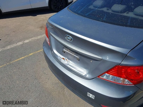 2013 Hyundai Accent GLS with VIN KMHCT4AE8DU559571, listed as a IAAI auction lot 41830783 with 88,170 mi miles. Bid and sale history available at carsss.com. Image 6.