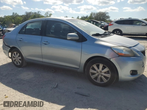 2009 Toyota Yaris with VIN JTDBT903591302633, listed as a Copart auction lot 53512185 with 351,622 mi miles and Salvage Title. Bid and sale history available at carsss.com. Image 4.