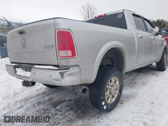 2017 Ram 2500 Laramie with VIN 3C6UR5FL9HG652815, listed as a IAAI auction lot 41553727 with 132,211 mi miles. Bid and sale history available at carsss.com. Image 4.