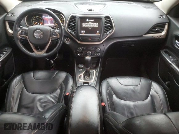 2014 Jeep Cherokee Limited with VIN 1C4PJMDB7EW138895, listed as a Copart auction lot 52585115 with 199,744 mi miles and Salvage Title. Bid and sale history available at DreamBid. Image 8.