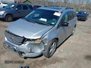 2012 Honda Odyssey Touring with VIN 5FNRL5H93CB042392, listed as a IAAI auction lot 41859533 with 169,141 mi miles. Bid and sale history available at carsss.com. Image 17.