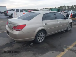 2008 Toyota Avalon XL with VIN 4T1BK36BX8U261553, listed as a IAAI auction lot 41382471 with 148,013 mi miles and . Bid and sale history available at carsss.com. Image 4.