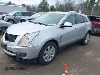 2014 Cadillac SRX Luxury Collection z VIN 3GYFNEE33ES670356, wystawiony jako IAAI lot #42008087 z przebiegiem 59 953 mil mil oraz . Historia ofert i sprzedaży dostępna na DreamBid. Obrazek 19.