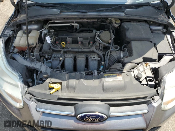 2014 Ford Focus SE z VIN 1FADP3K24EL160780, wystawiony jako Copart lot #57642995 z przebiegiem 121 462 mil mil oraz Szkoda całkowita • Salvage title. Historia ofert i sprzedaży dostępna na DreamBid. Obrazek 11.