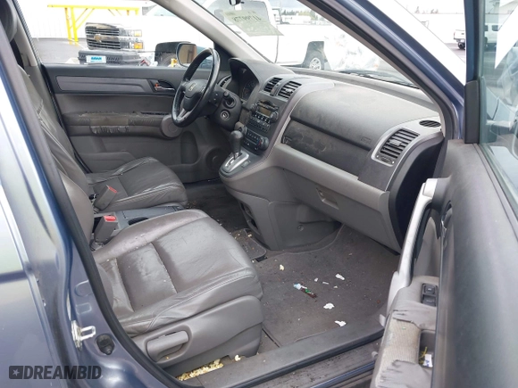 2007 Honda CR-V EX-L with VIN JHLRE38717C041146, listed as a IAAI auction lot 41799778 with 217,261 mi miles. Bid and sale history available at carsss.com. Image 5.