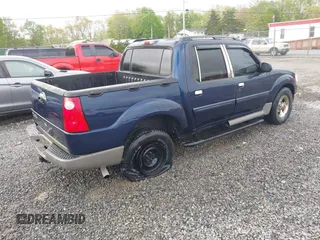 2003 Ford Explorer Sport Trac XLS z VIN 1FMZU67E23UA17889, wystawiony jako IAAI lot #42167263 z przebiegiem 189 849 mil mil oraz . Historia ofert i sprzedaży dostępna na DreamBid. Obrazek 4.