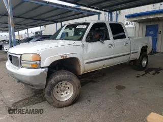 2002 GMC Sierra 1500HD SLE z VIN 1GTGK13U12F187178, wystawiony jako Copart lot #86453504 z przebiegiem 187 711 mil mil oraz Szkody całkowita. Historia ofert i sprzedaży dostępna na DreamBid. Obrazek 1.