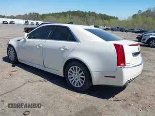 2012 Cadillac CTS z VIN 1G6DA5E51C0151324, wystawiony jako IAAI lot #41811207 z przebiegiem 100 407 mil mil oraz . Historia ofert i sprzedaży dostępna na DreamBid. Obrazek 3.