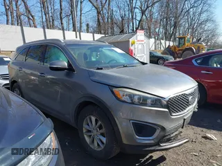 2016 Kia Sorento LX with VIN 5XYPGDA39GG061748, listed as a IAAI auction lot 41720011 with 124,084 mi miles. Bid and sale history available at carsss.com. Image 1.