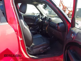 2015 MINI Countryman S with VIN WMWZC3C52FWT05204, listed as a IAAI auction lot 41492775 with 80,785 mi miles and . Bid and sale history available at DreamBid. Image 5.