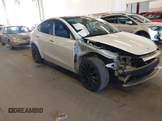2021 Tesla Model Y Performance with VIN 5YJYGDEF4MF263473, listed as a IAAI auction lot 41851083 with 39,289 mi miles and . Bid and sale history available at DreamBid. Image 1.