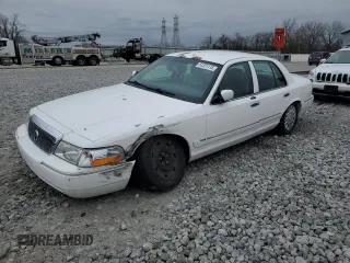 2004 Mercury Grand Marquis GS z VIN 2MEFM74W04X636591, wystawiony jako Copart lot #51321115 z przebiegiem 65 400 mil mil oraz Szkody całkowita. Historia ofert i sprzedaży dostępna na DreamBid. Obrazek 1.