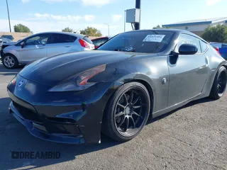 2016 Nissan 370Z with VIN JN1AZ4EH1GM933265, listed as a IAAI auction lot 41831484 with 98,193 mi miles. Bid and sale history available at carsss.com. Image 2.