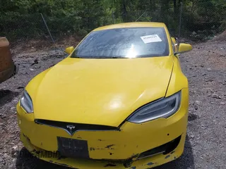 2016 Tesla Model S 70 kWh Battery with VIN 5YJSA1E14GF141579, listed as a IAAI auction lot 42209119 with 105,947 mi miles and . Bid and sale history available at carsss.com. Image 11.