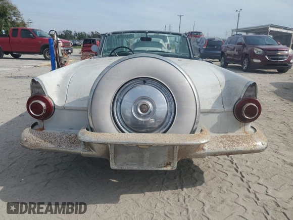1956 Ford Thunderbird with VIN P6FH263430, listed as a Copart auction lot 75977804 with 52,420 mi miles and Salvage Title. Bid and sale history available at DreamBid. Image 6.