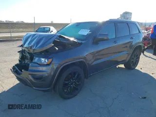 2017 Jeep Grand Cherokee Laredo with VIN 1C4RJFAG7HC769642, listed as a IAAI auction lot 41367874 with 128,095 mi miles. Bid and sale history available at carsss.com. Image 2.