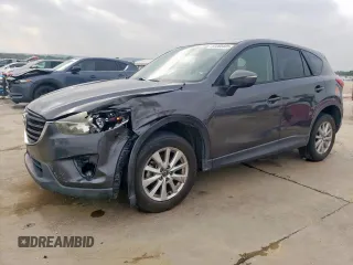 2016 Mazda CX-5 Touring z VIN JM3KE2CY8G0807018, wystawiony jako Copart lot #57283485 z przebiegiem 207 492 mil mil oraz Szkoda całkowita • Salvage title. Historia ofert i sprzedaży dostępna na DreamBid. Obrazek 1.