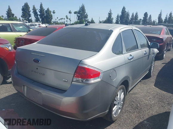 2008 Ford Focus SE with VIN 1FAHP35N88W242103, listed as a IAAI auction lot 39468422 with 169,911 mi miles. Bid and sale history available at carsss.com. Image 4.