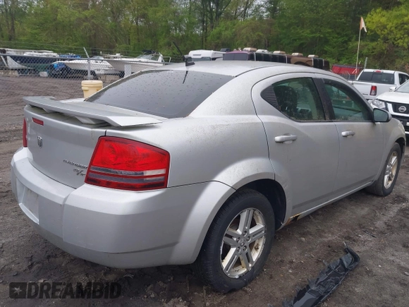 2010 Dodge Avenger R/T with VIN 1B3CC5FB2AN176824, listed as a IAAI auction lot 42201641 with 190,036 mi miles and . Bid and sale history available at DreamBid. Image 4.