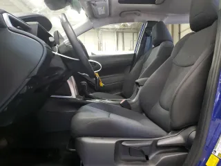 2024 Toyota Corolla Cross LE with VIN 7MUBAABG5RV088288, listed as a Copart auction lot 52493325 with 59,788 mi miles and Clean title. Bid and sale history available at DreamBid. Image 7.