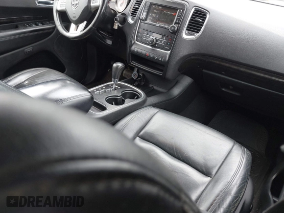 2013 Dodge Durango Crew with VIN 1C4RDJDG9DC667338, listed as a IAAI auction lot 42639559 with 137,020 mi miles and . Bid and sale history available at DreamBid. Image 5.
