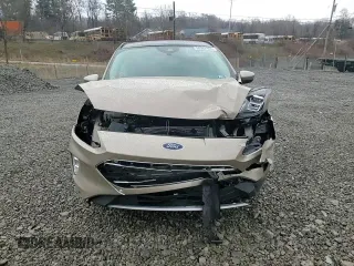 2021 Ford Escape Titanium with VIN 1FMCU9J90MUB15582, listed as a Copart auction lot 50982955 with 27,041 mi miles and Salvage Title. Bid and sale history available at carsss.com. Image 11.