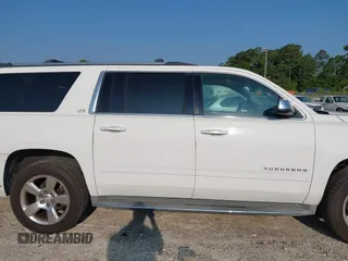 2016 Chevrolet Suburban LTZ with VIN 1GNSCJKC9GR236530, listed as a IAAI auction lot 42387868 with 185,159 mi miles and . Bid and sale history available at DreamBid. Image 13.