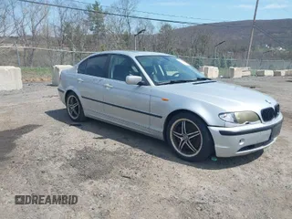 2003 BMW 3 Series 330i with VIN WBAEV53463KM25215, listed as a IAAI auction lot 42048348 with 107,271 mi miles. Bid and sale history available at carsss.com. Image 1.