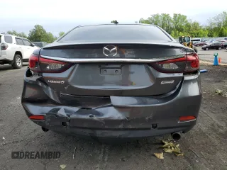 2017 Mazda 6 Grand Touring с VIN JM1GL1W55H1140064, выставлен на аукционе Copart как лот 57503425 с пробегом 74 304 миль миль и Списание • Salvage title. История ставок и продаж доступна на DreamBid. Изображение 6.