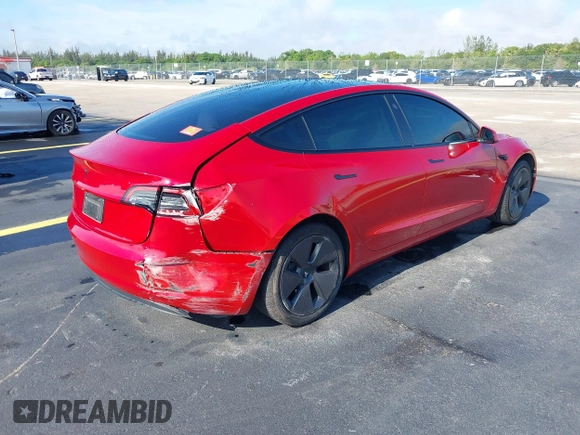 2023 Tesla Model 3 with VIN 5YJ3E1EA2PF588467, listed as a IAAI auction lot 42254921 with 11,217 mi miles and . Bid and sale history available at DreamBid. Image 4.