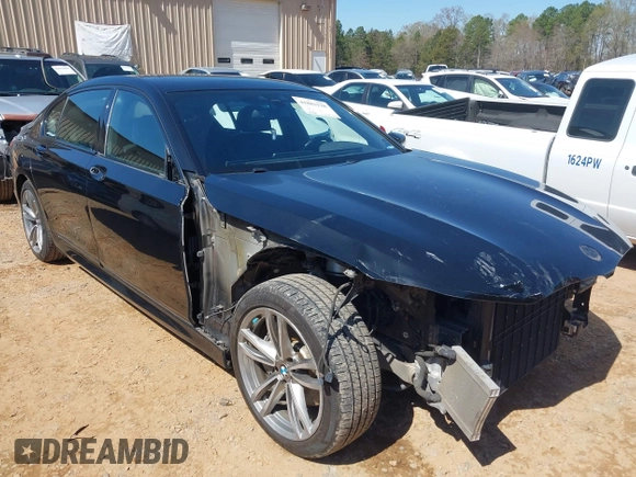 2019 BMW 7 Series 740i xDrive with VIN WBA7E4C57KGV70521, listed as a IAAI auction lot 41881538 with 114,480 mi miles and . Bid and sale history available at DreamBid. Image 1.