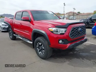 2021 Toyota Tacoma SR with VIN 3TMCZ5AN7MM433098, listed as a IAAI auction lot 41808859 with 58,878 mi miles and . Bid and sale history available at DreamBid. Image 1.