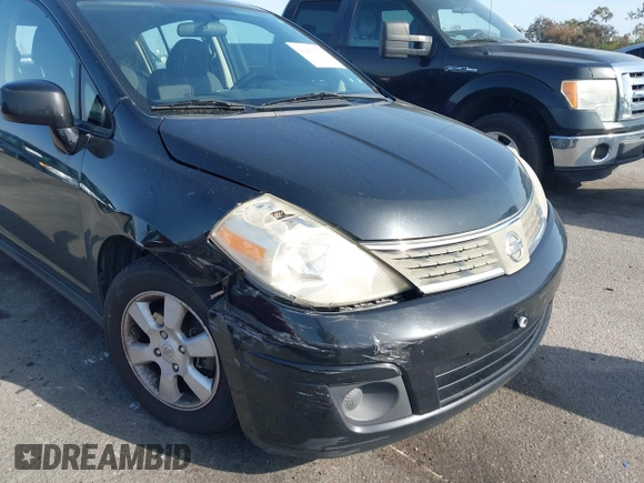 2009 Nissan Versa 1.8 SL with VIN 3N1BC13E79L406566, listed as a IAAI auction lot 41900375 with 109,470 mi miles. Bid and sale history available at carsss.com. Image 6.